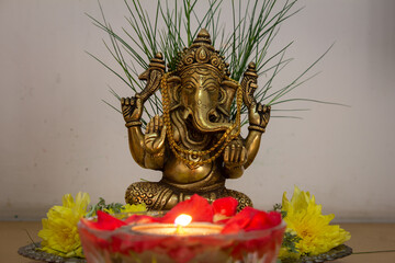 Idol of Indian god lord ganesha decorated during ganesh chaturthi festival. God with elephant face