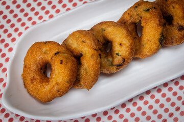 View of Medu Vada also known as Ulundu Vadai is a popular and traditional recipe of Tamil Nadu made with Urad dal.