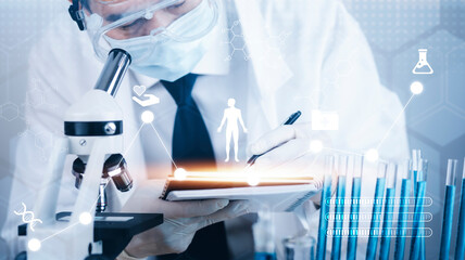 biochemical research scientist working with a microscope for the virus,Doctor man write a history...