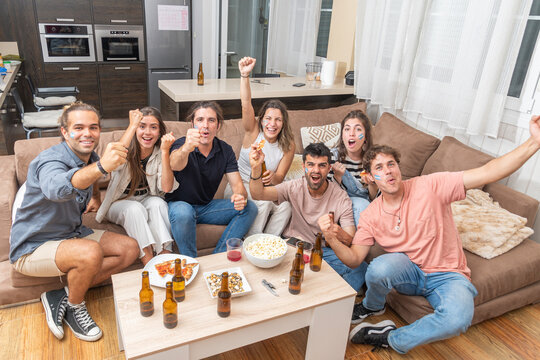Group of friends watching a soccer match