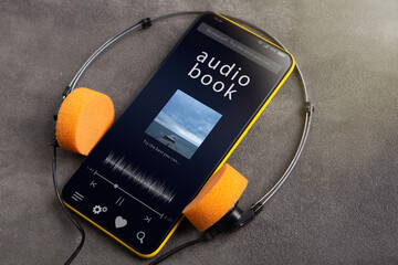 Streaming service. Listen audiobook online concept, online music player app on smartphone