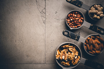 Assortment of nuts in bowls