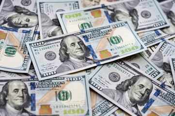 stack of money, US dollars background, cash, banknotes laid out on the table