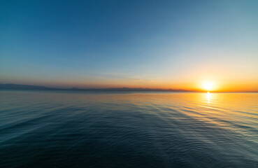 Beautiful golden sunset over the lake. Sunset landscape.