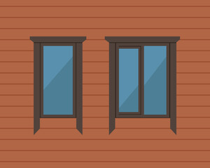 laconic platbands on the windows of a wooden house