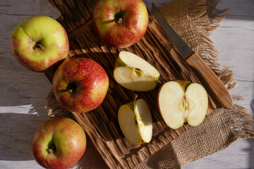 Fresh apples on old background