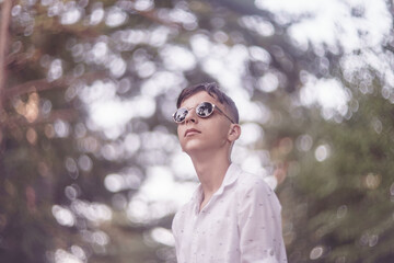 portrait of handsome young man outdoors