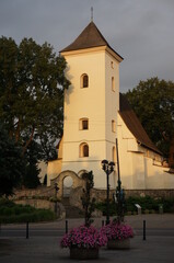 Fototapeta premium Gothic Church of St. Wojciech and Our Lady of Snow (kosciol sw. Wojciecha i Matki Boskiej Snieznej) at sunset. Mikolow, Poland.