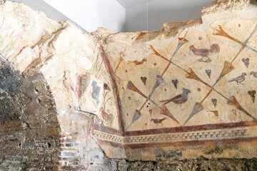Fototapeta na wymiar Boveda de Mera, Spain. The Roman Temple of Santalla or Santa Eulalia, dedicated to goddess Cybele. Bird frescoes