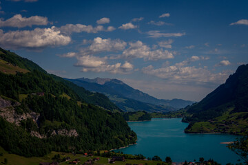 Fototapeta na wymiar View of Lungern and its large lake, Switzerland. Canton of Bern.