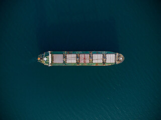 large bulk carrier transports grain at sea, aerial view