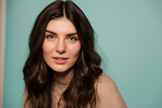 Portrait Beautiful Young Brunette Woman With Blue Eyes