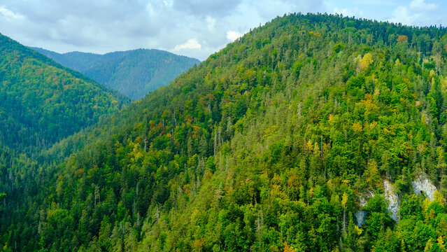 A view of the most beautiful mountains in a panoramic scene. View from Tomasovsky Vyhlad in Slovak Paradise National Park. A blue haze is in the air.