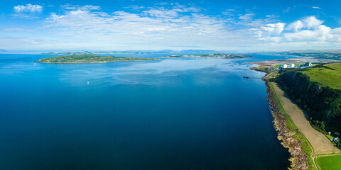 Aerial view of the firth of Clyde near Glasgow on the west coast of Scotland showing the isles of cumbrae and hunterston power station