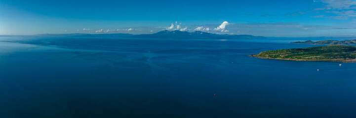 Aerial view of the firth of Clyde near Glasgow on the west coast of Scotland showing the isles of cumbrae and hunterston power station