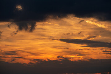 Sunset on a cloudy sky in Germany during summer