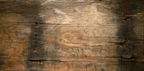 Photo of the texture of an old shipboard.The background is made of old wood with cracks and losses. Vintage wooden text background.
