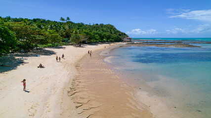 Aerial view of Praia do Espelho, Porto Seguro, Bahia, Brazil. Natural pools in the sea, cliffs and greenish water
