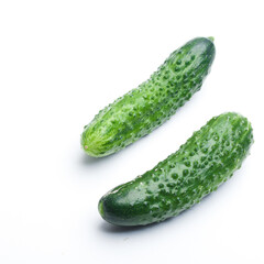 Ripe fresh green cucumber isolated on a white background