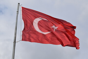 turkish flag on the wind - obrazy, fototapety, plakaty