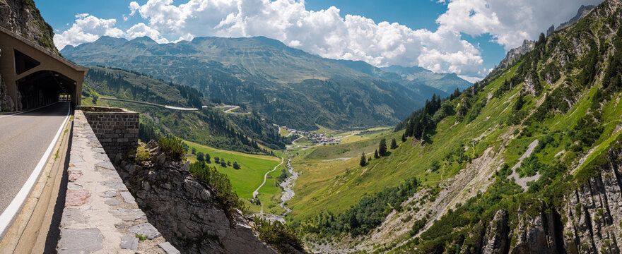 Flexenass road rising up from Lechtal in austria on a summer day. Crazy winding road from the valley up on the high alpine road.