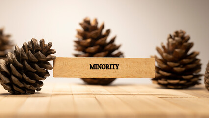 Minority written on wooden surface. Law and state