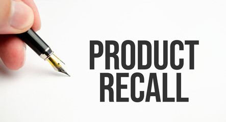 PRODUCT RECALL words on pen and paper
