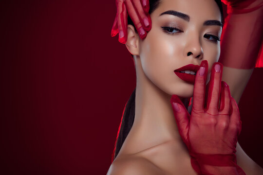 Close up photo of charming chic lady wearing red gloves look attractive empty space isolated burgundy color background
