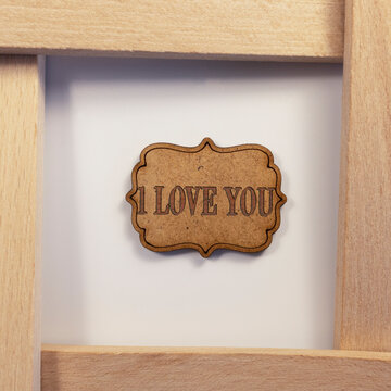I love you written on wooden surface. wooden concept.