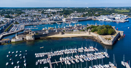 Aerial view of Concarneau, a medieval walled city in Brittany, France - Sandy beach under the...