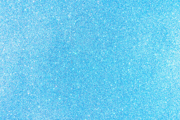 Background with sparkles. Backdrop with glitter. Shiny textured surface. Soft blue