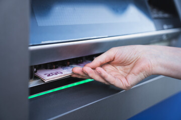 Withdraw cash from an ATM 
