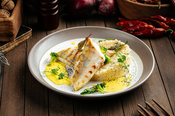 Gourmet pike perch fillet with couscous and bearnaise sauce