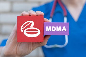 MDMA MethyleneDioxyMethAmphetamine drugs medical concept. MDMA pill known as ecstasy E or molly, is...