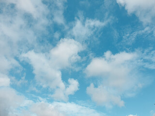 Big cloud floating in blue sky background with copy space.meteorology.The sky is scattered with fog.