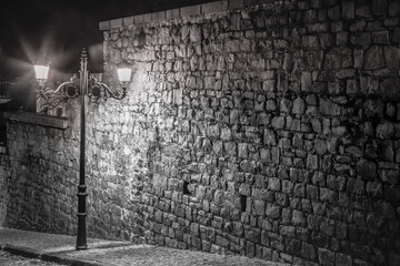 Street corner with lamp in Prague old town at night, Czech Republic