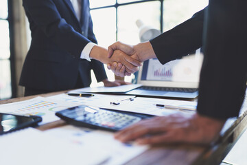 Business people shaking hands, finishing up meeting. business hand shake concept.