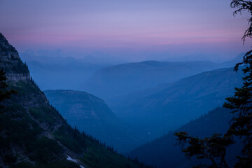 Layers of Mountains Fade Into The Forest Fire Smoke Of Glacier