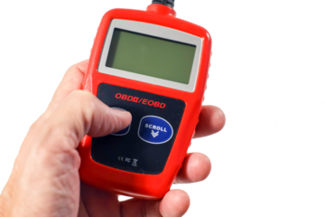 Hand holding vehicle code reader