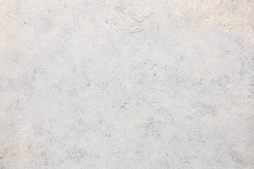 Light cement wall as background, closeup