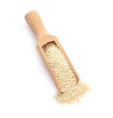 Fototapeta na wymiar Wooden scoop of sesame seeds on white background