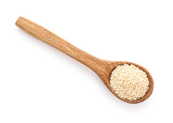 Wooden spoon with sesame seeds isolated on white background