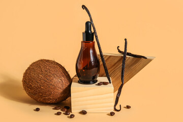 Composition with bottle of essential oil, coconut and vanilla sticks on color background