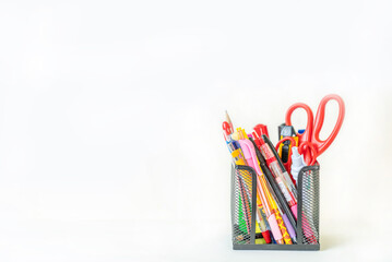 Set of stationery items as scissors, cutter, pen and pencil.