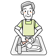 エプロンを着けて食器洗いをするシニア男性