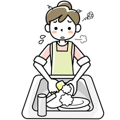 疲れた表情で食器洗いをする若い女性