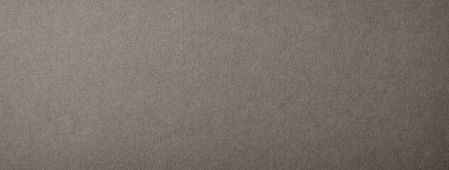 質感のあるチャコールグレーのクラフトペーパーの背景テクスチャー