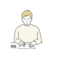 はんこを押す男性