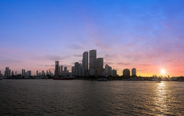 Colombia, scenic Cartagena bay Bocagrande and panorama of city skyline at sunset.
