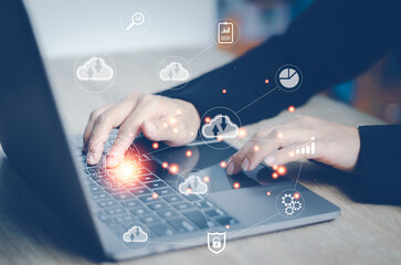 Business Woman use Laptop with cloud computing diagram show on hand. AI Cloud technology. Data storage. Networking and internet service concept.